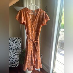 An orange high low perfect for summer dress